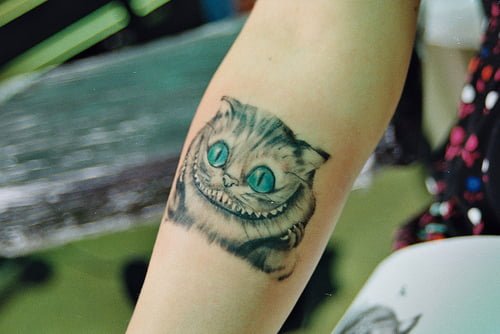 Tatuaje gato de Cheshire