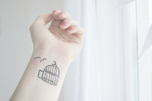 tatuajes jaulas de pajaros
