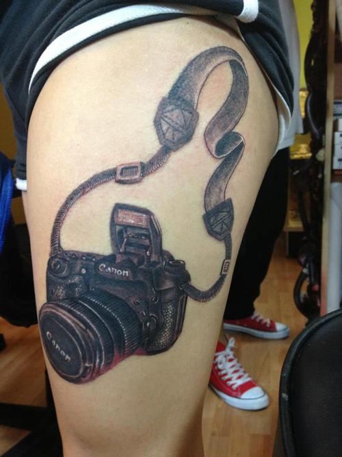 tatuaje cámara fotográfica