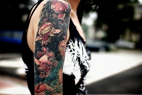 Tatuaje brazo y hombro demonios