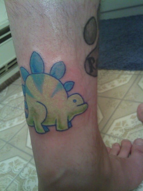 Tattoo caricatura Dinosaurio