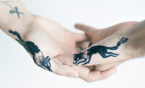 Tatuaje pareja con zorros