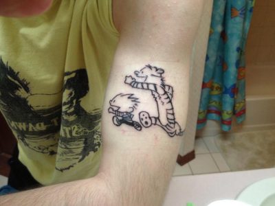 Calvin and Hobbes arm tattoo