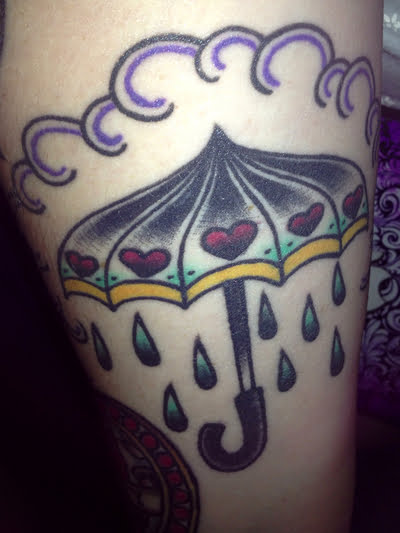 Umbrella tattoo with hearts