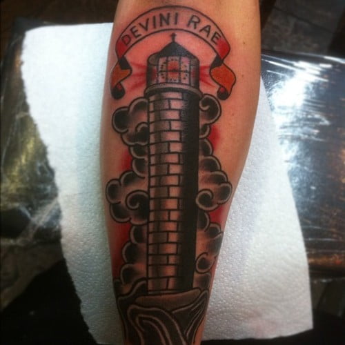 Black lighthouse tattoo