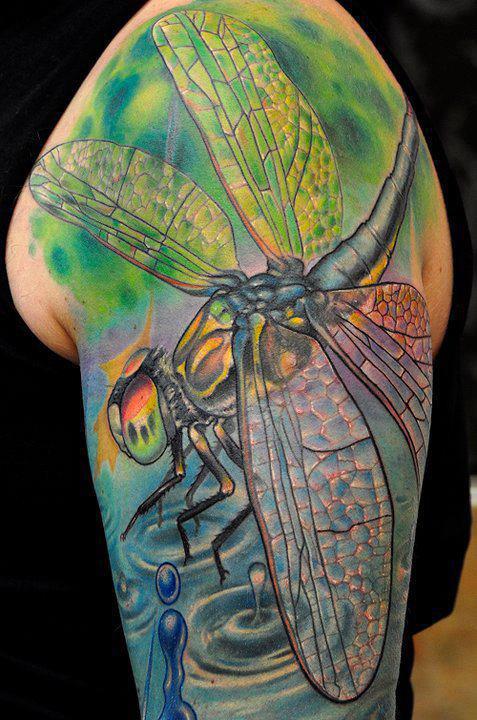 Dragonfly tattoo on shoulder