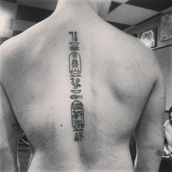 hieroglyphic tattoo on back