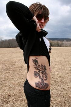 Tree tattoo on hip and stomach