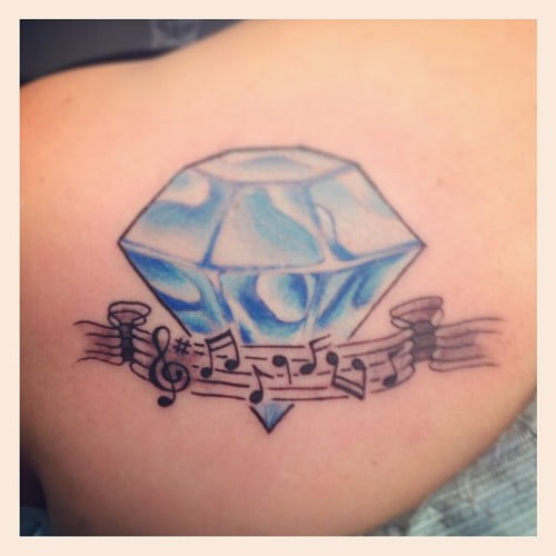 Diamond and music tattoo