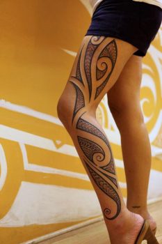 girl tattooed on the leg