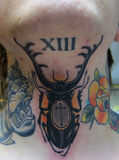 Throat tattoo beetle
