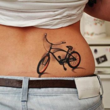 Bike tattoo on lower back