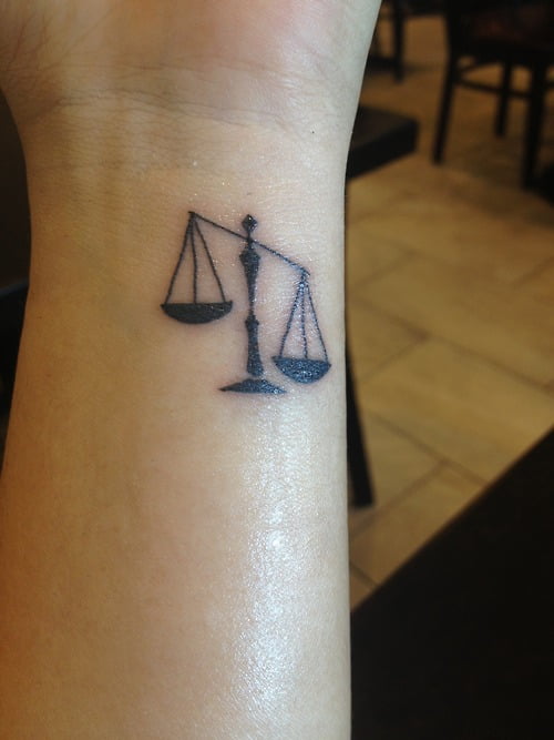 Justice tattoo