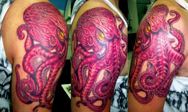 Magenta octopus tattoo