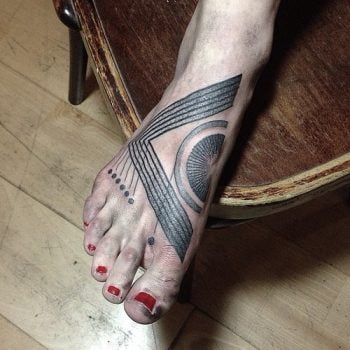 Mxm Foot tattoo