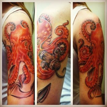 Orange octopus tattoo