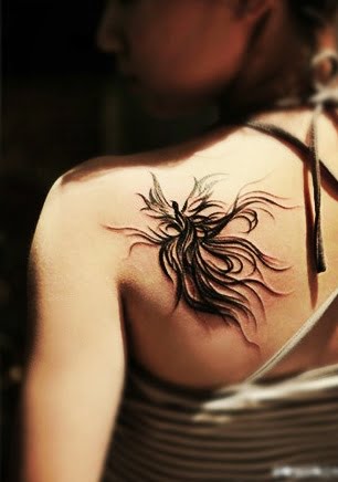 Phoenix bird tattoo on the back