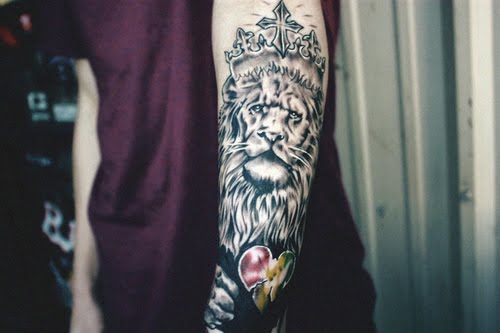 Lion tattoo on arm