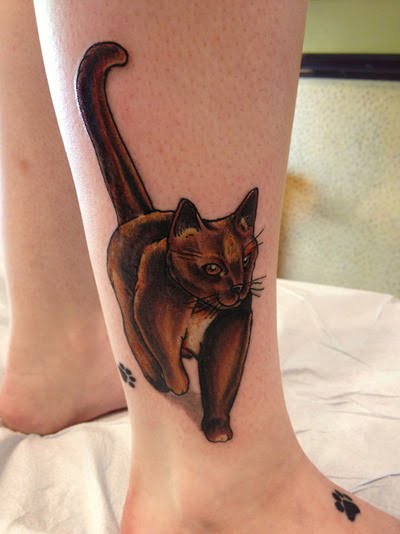 Tatuaje gato en el pie