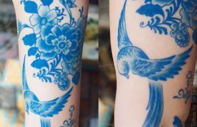 Tatuaje paisaje primaveral en la pierna