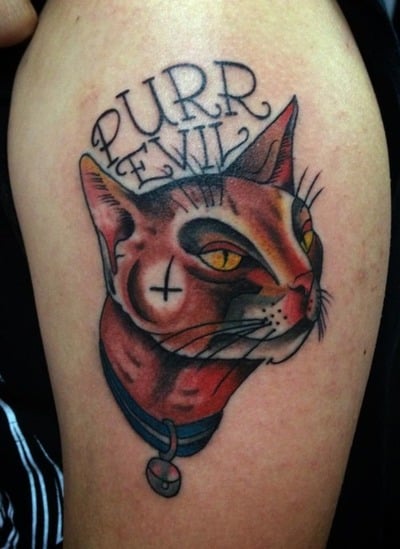 Tatuaje Purr Evil en el brazo