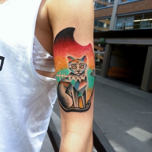 Tatuaje gato gris