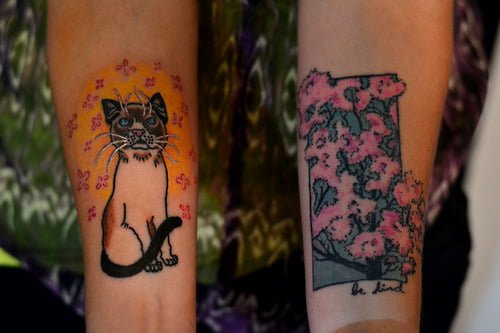 Tatuaje gato y árbol