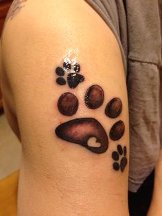 Tatuaje huellas perro
