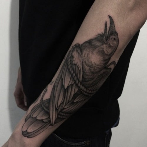 Tatuaje de cuervo atrapado