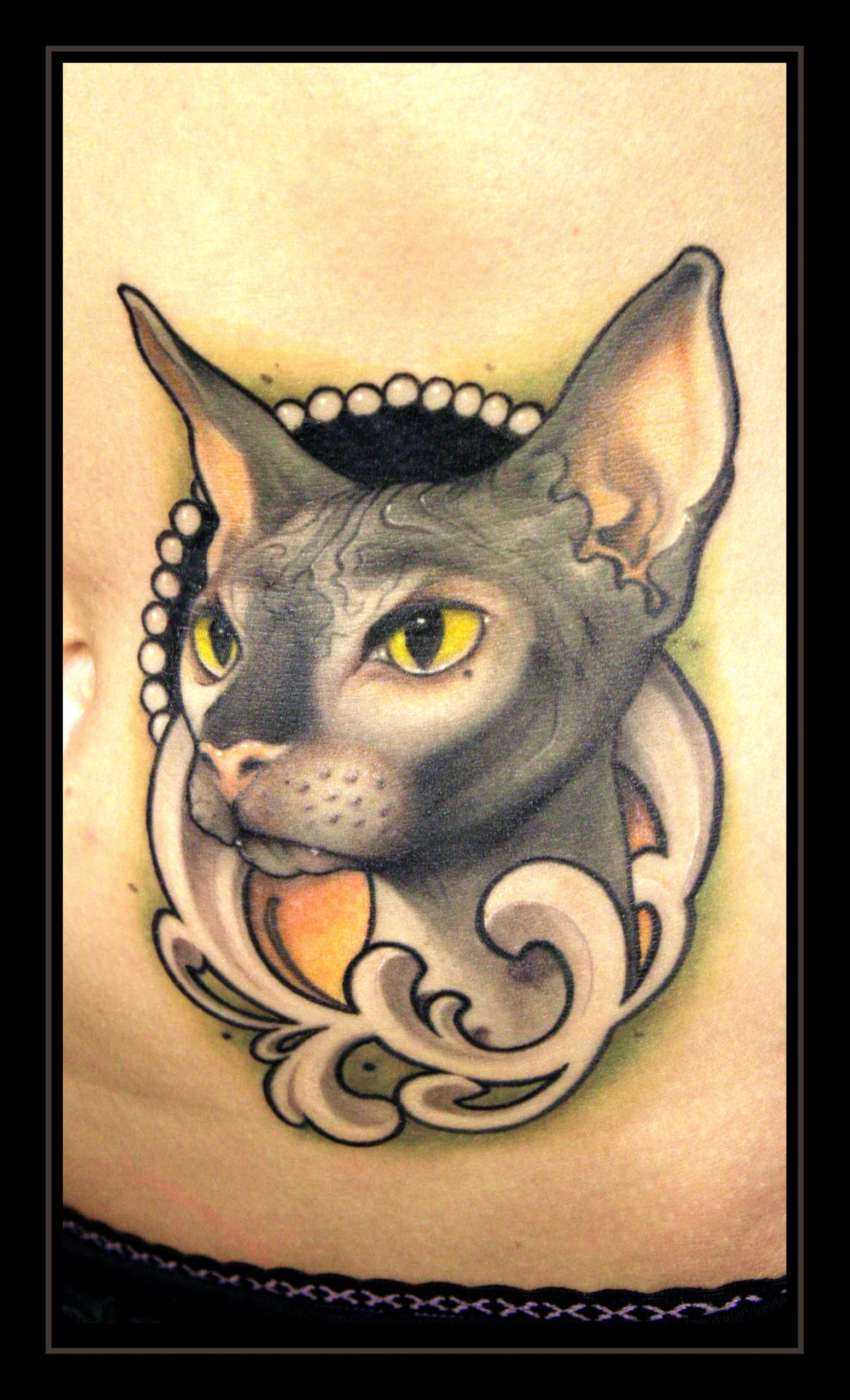 Tatuaje gato gris