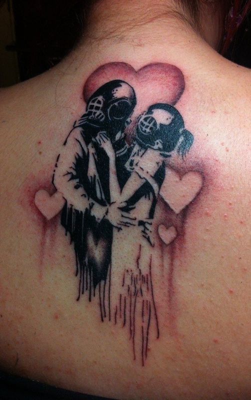Tatuaje de buzos enamorados