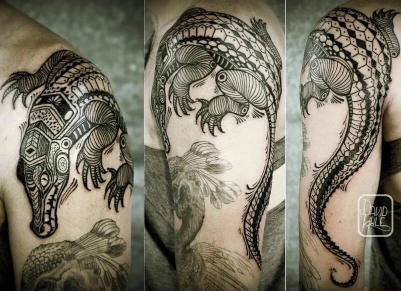 Tatuaje cocodrilo en el brazo