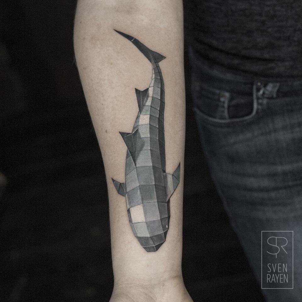 Tatuaje de ballena en el brazo